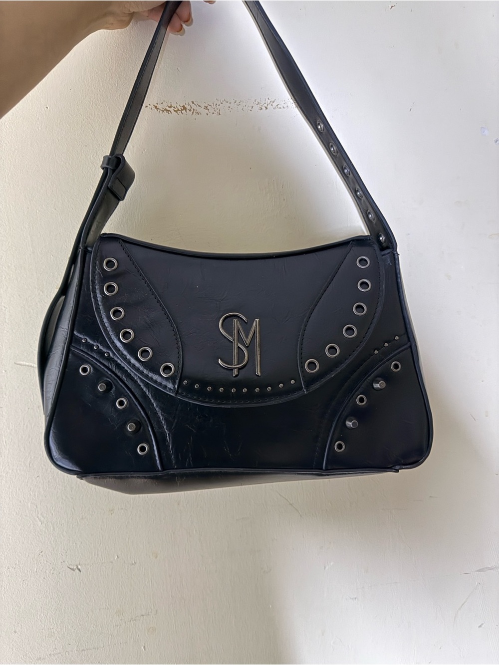 SM-Emblem Black Shoulder Bag — Stylish Eyelet Accent